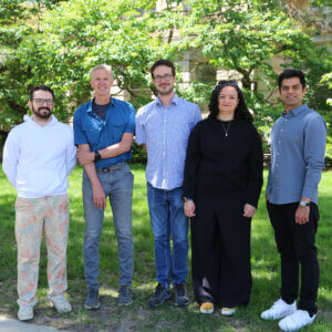 Research group standing outside.